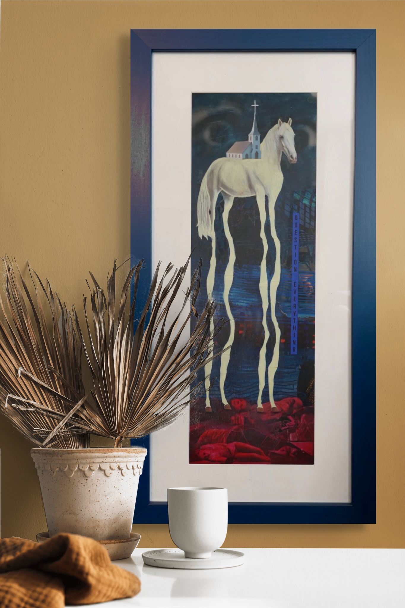 Framed artwork of a white horse on a dark background with cityscape elements, displayed on a wall with decor items.