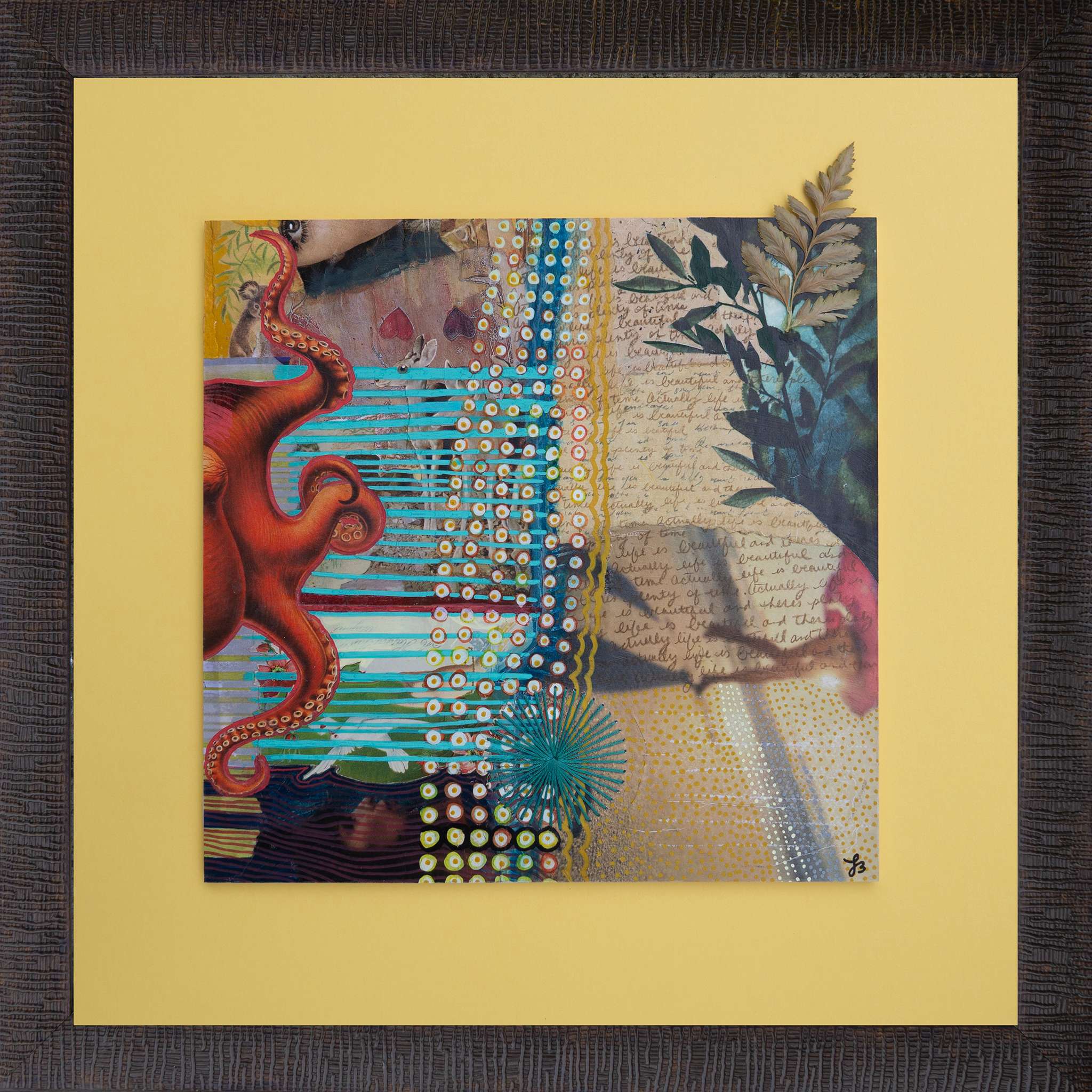 Collage art with various elements including an octopus, plants, and text in a frame with yellow mat board.
