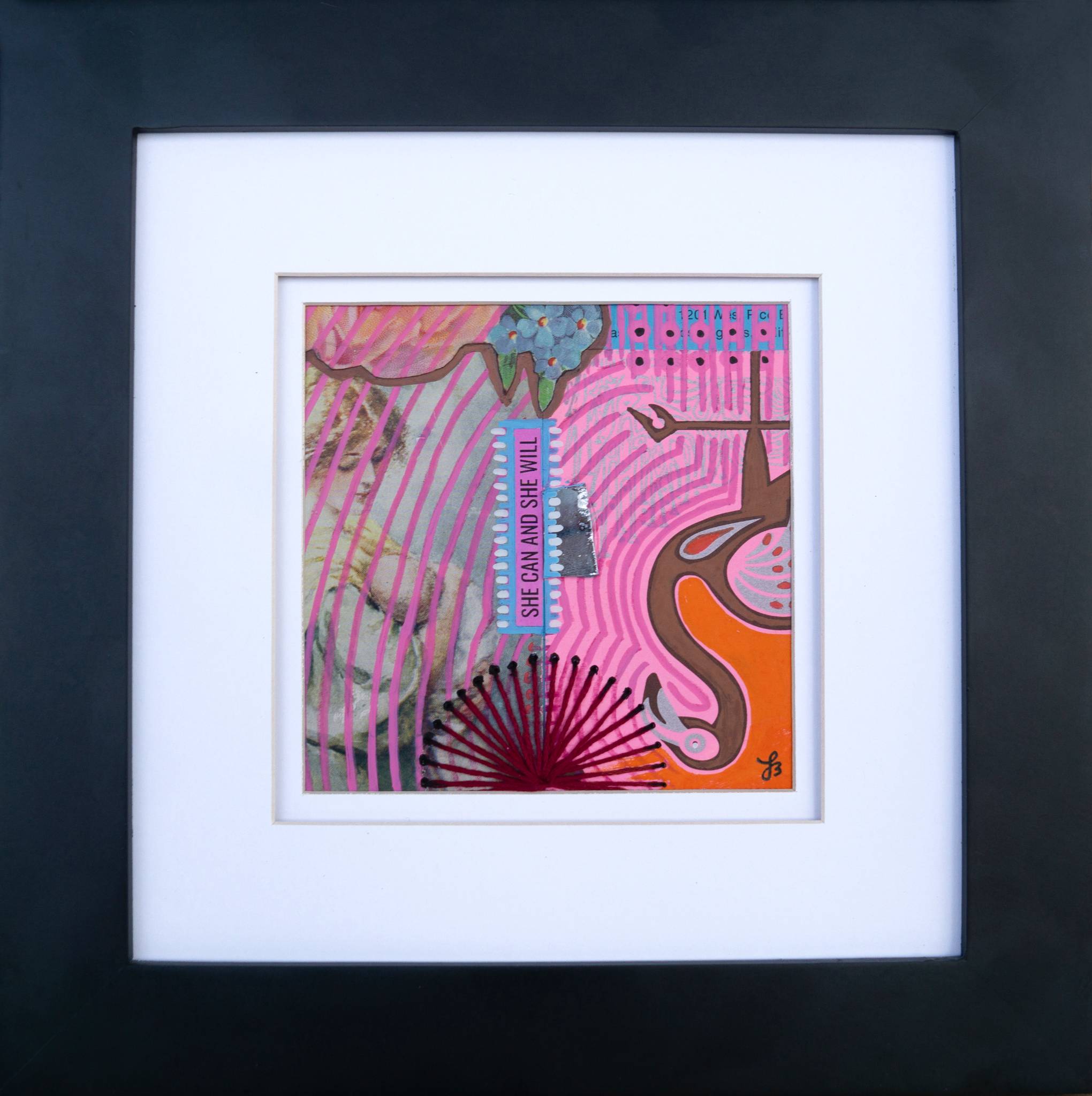 Collage artwork with colorful patterns and text saying "SHE CAN AND SHE WILL" with white mat and black frame