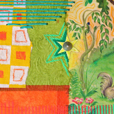 Detail shot showing colorful patchwork fabric with star design and nature-themed elements